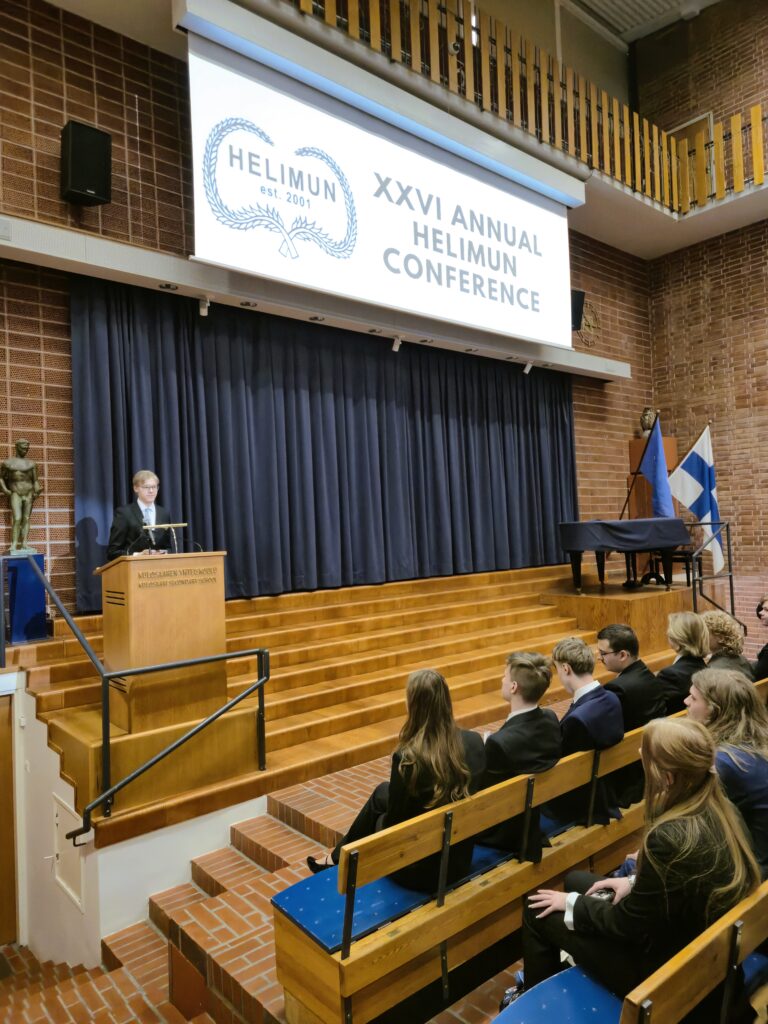 5th and 6th of May, HELIMUN ry hosted its 26th annual student-run conference in KSYK, providing students a unique platform for diplomacy and public speaking.
The session opened with an motivating keynote by President Tarja Halonen. Following two days of intense lobbying and debate the event concluded with final committee reports and closing speeches.